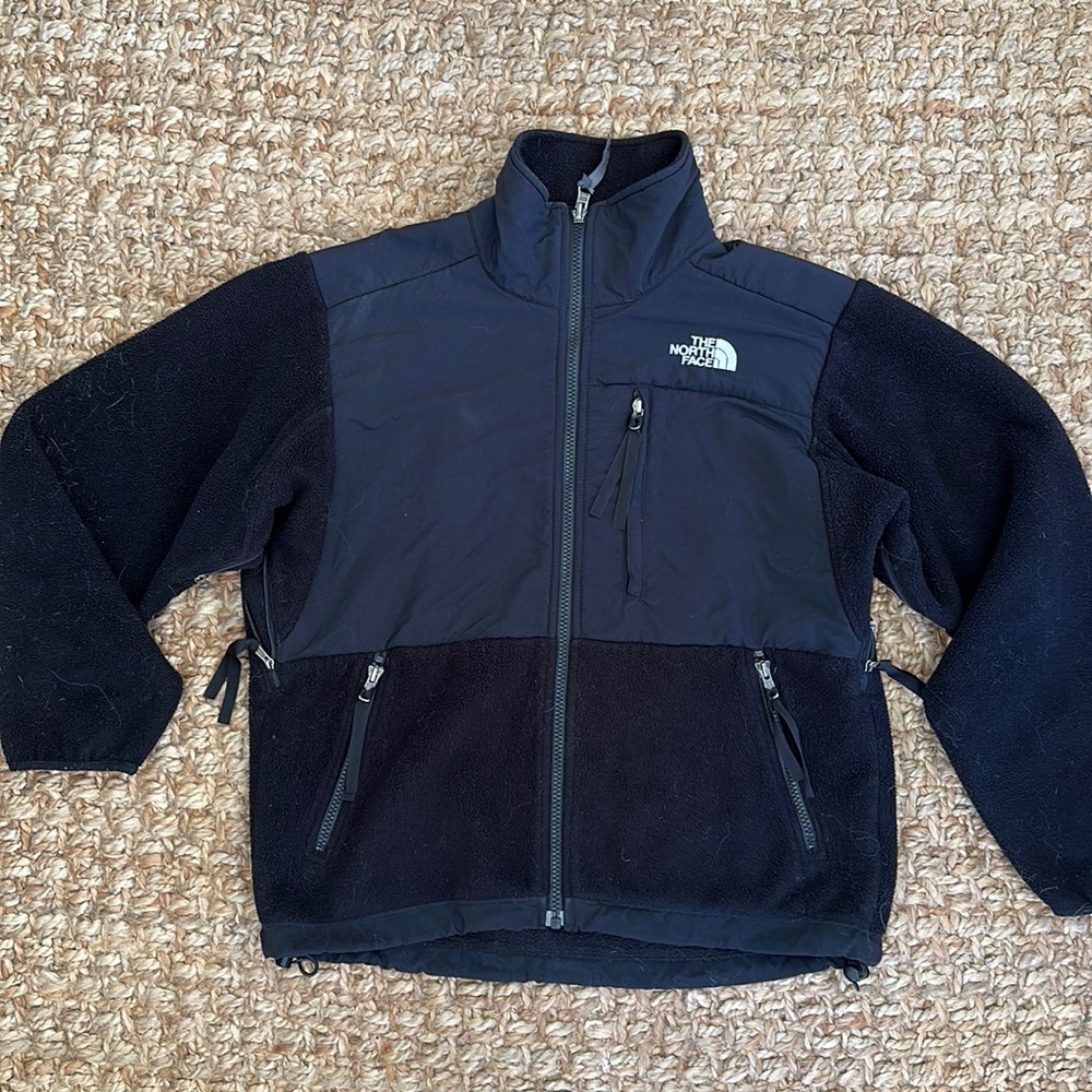 Black zip up Northface jacket